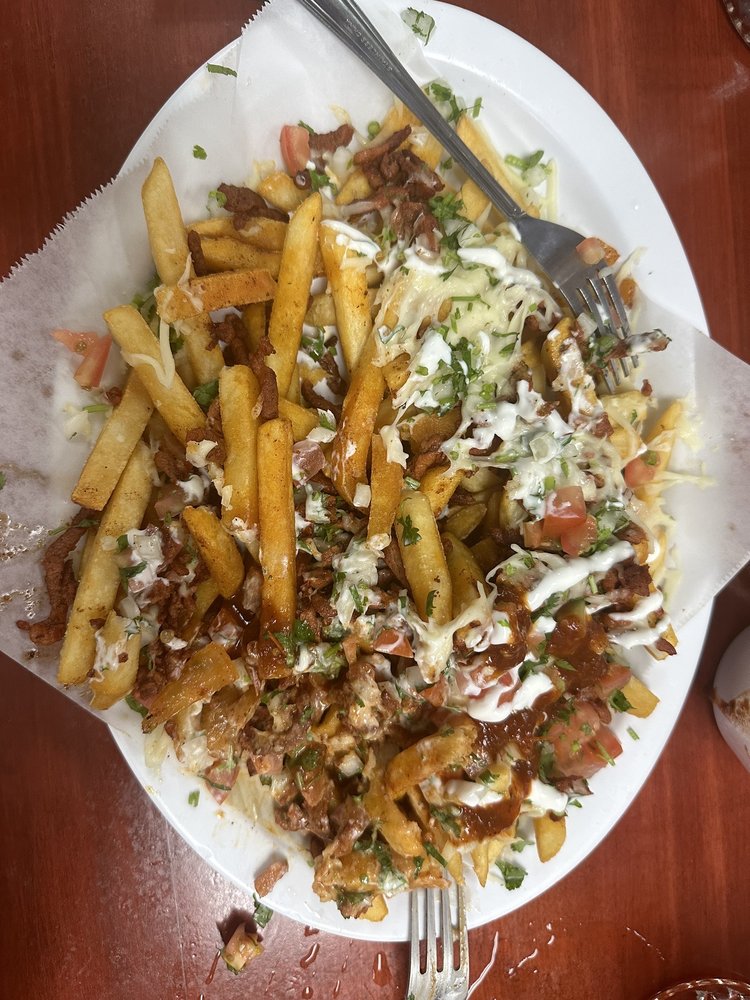 La Raza Barbacolleria Y Menuderia